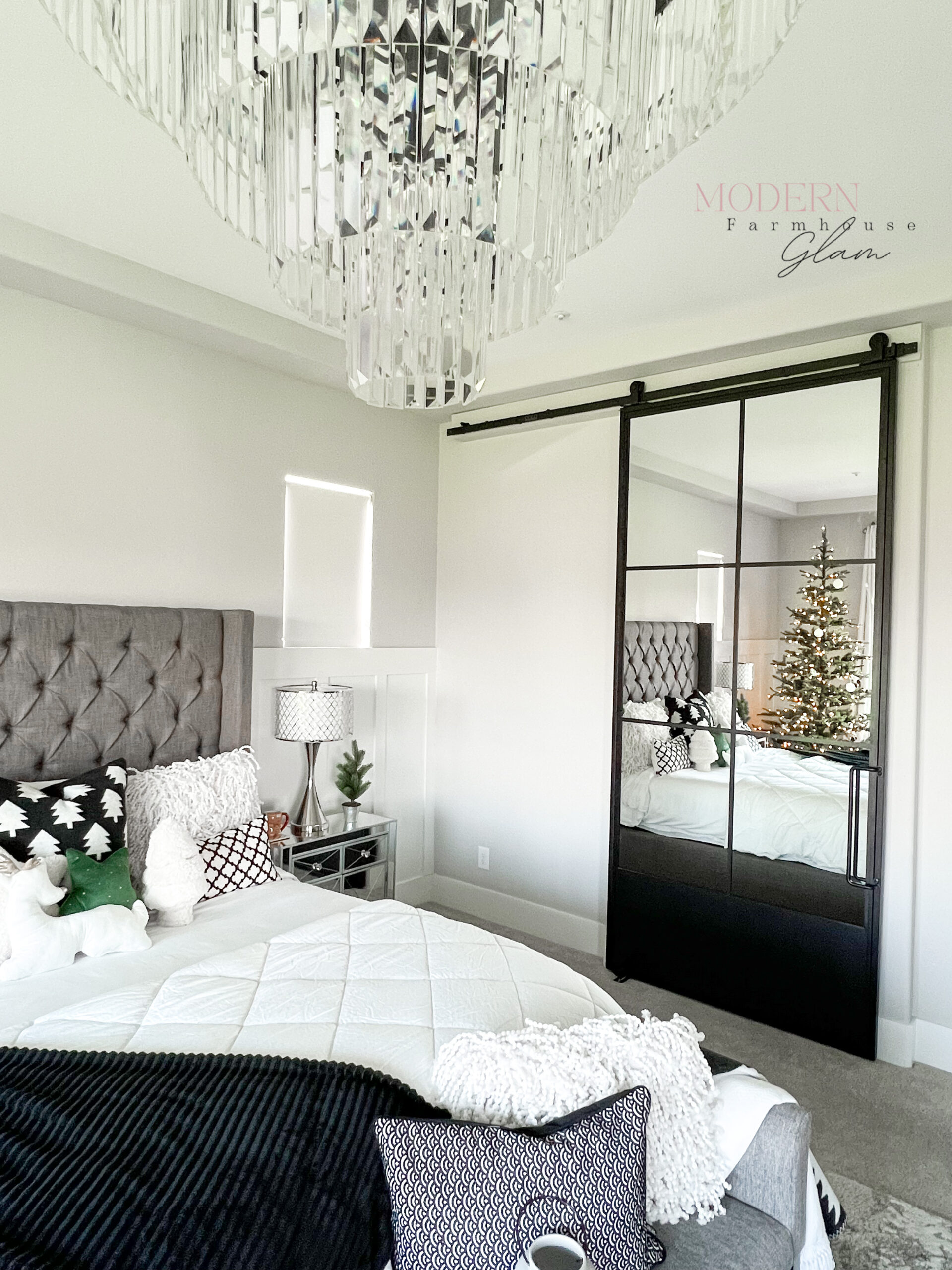 master bedroom furniture, rug, nightstands, crystal chandelier, bedding